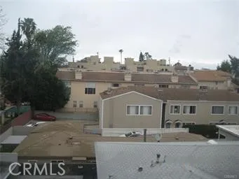 a view of a city from a yard