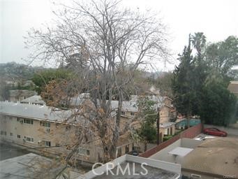 10878 Bloomfield Street, Unit 404 Toluca Lake, CA 91602 - Photo 36 of 36 a view of a city from a yard