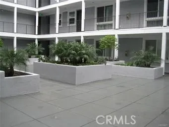 a view of white house with entrance