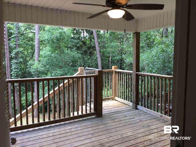 226 Montclair Loop Daphne, AL 36526 - Photo 18 of 27 226 Montclair Loop | Lake Forest | Tile Floor | LVT Flooring | Black Appliances | Back Deck
