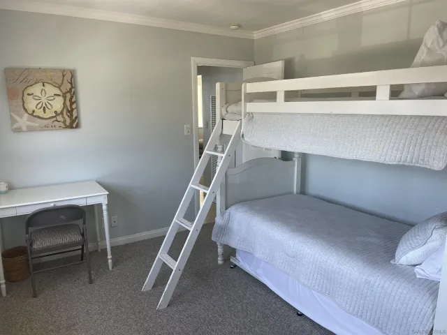 a view of entryway with stairs and furniture