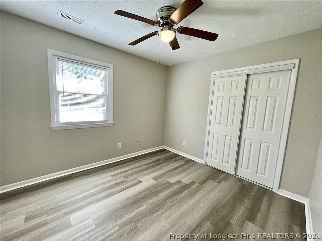 5985 McDonald Road Parkton, NC 28371 - Photo 12 of 20 a view of an empty room with a window