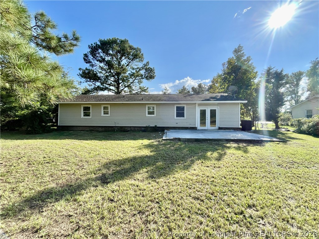 5985 McDonald Road Parkton, NC 28371 - Photo 20 of 20 a view of a house with a swimming pool