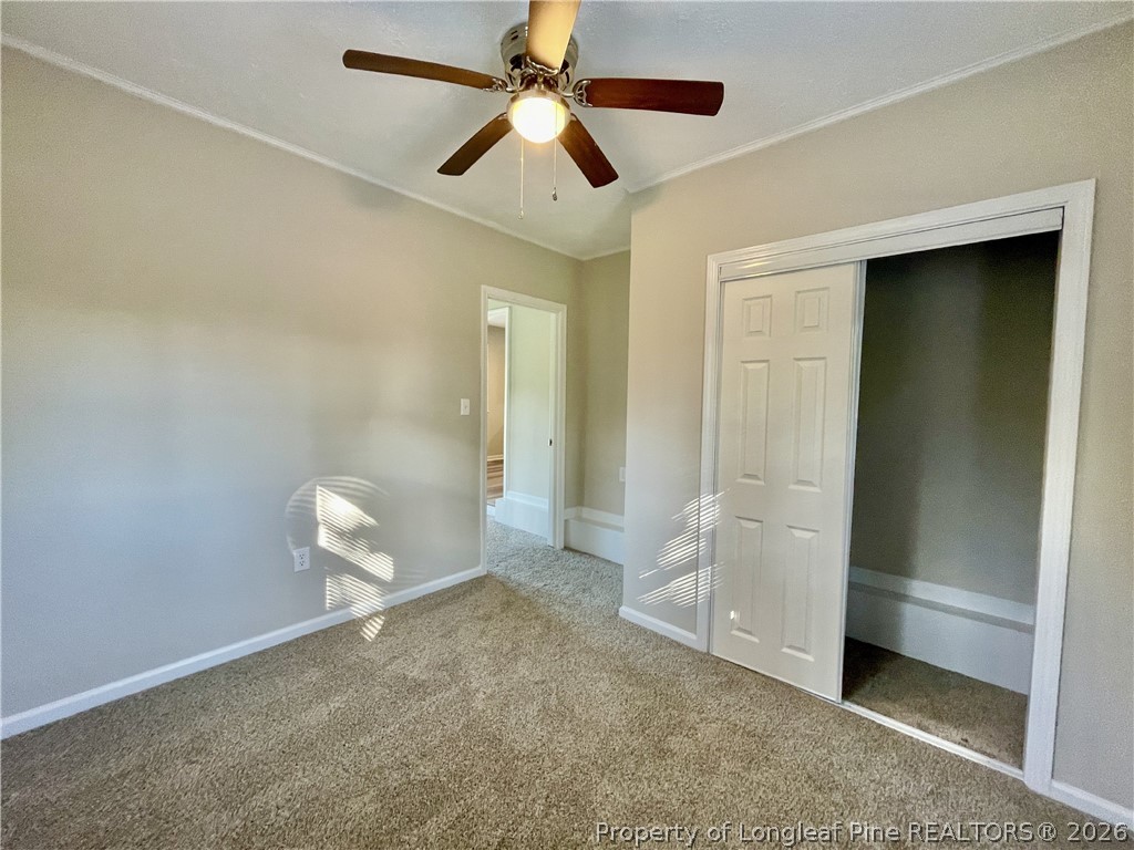 5985 McDonald Road Parkton, NC 28371 - Photo 9 of 20 wooden floor in an empty room