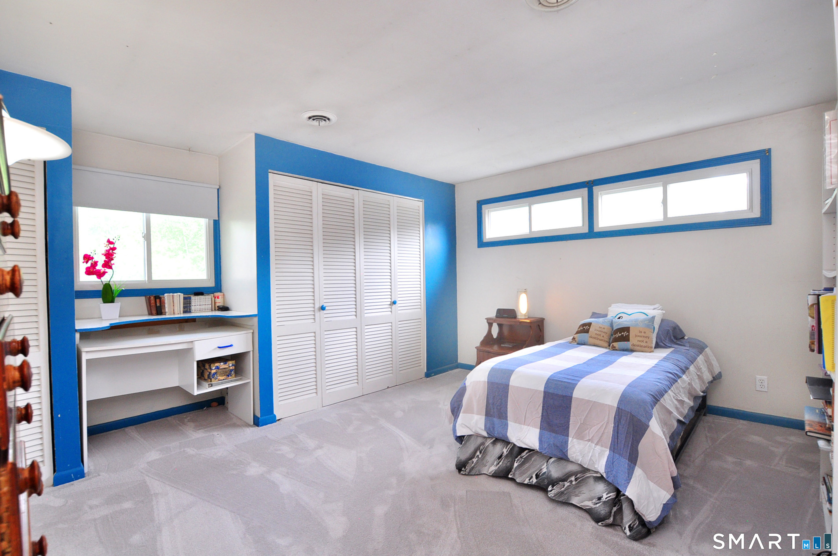 16 Miamis Road West Hartford, CT 06117 - Photo 27 of 39 This room has 2 large closets and a built in vanity or desk area.