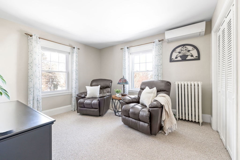 60 High Street Needham, MA 02494 - Photo 20 of 32 a living room with furniture and a window