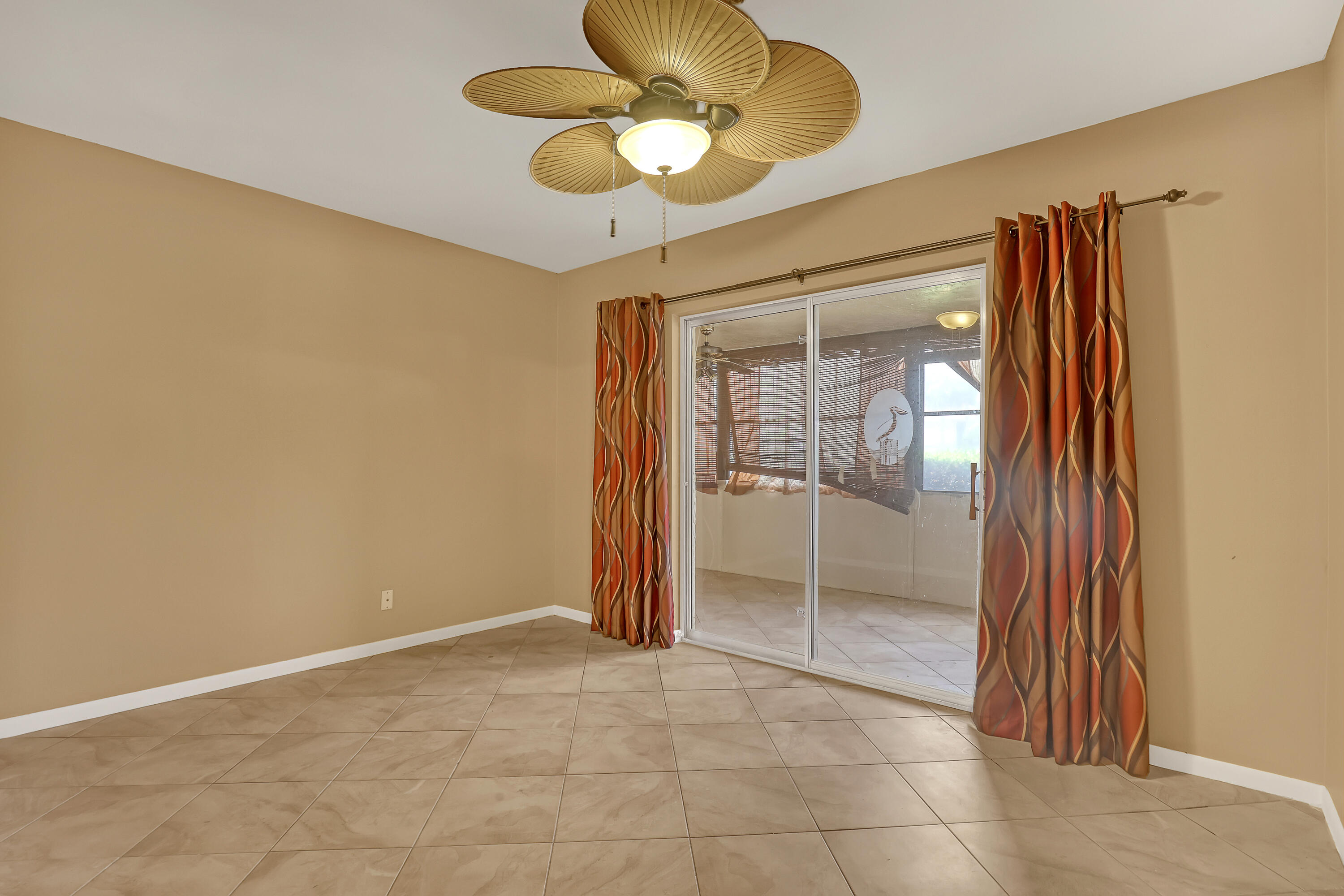 6257 Chasewood Drive, Unit B Jupiter, FL 33458 - Photo 20 of 36 a view of an empty room and window