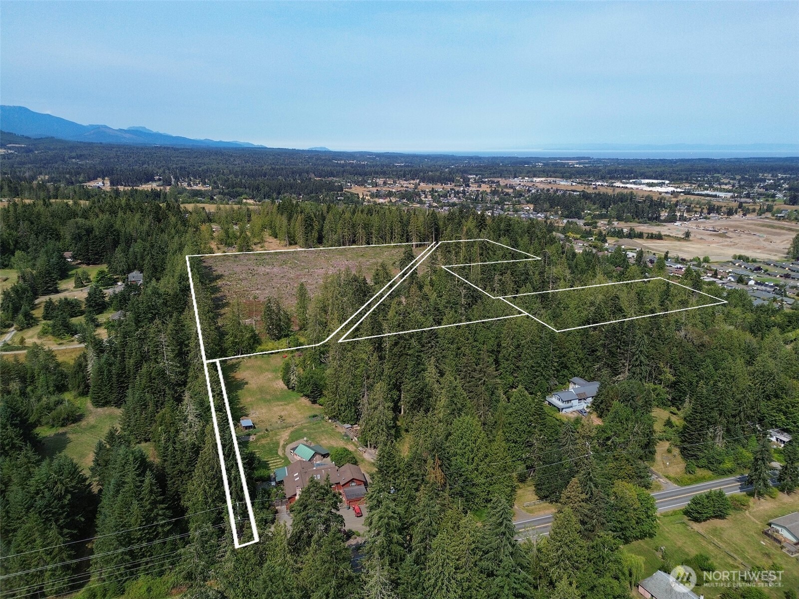 319 Reservoir Road Sequim, WA 98382 - Photo 13 of 38 an aerial view of multiple house