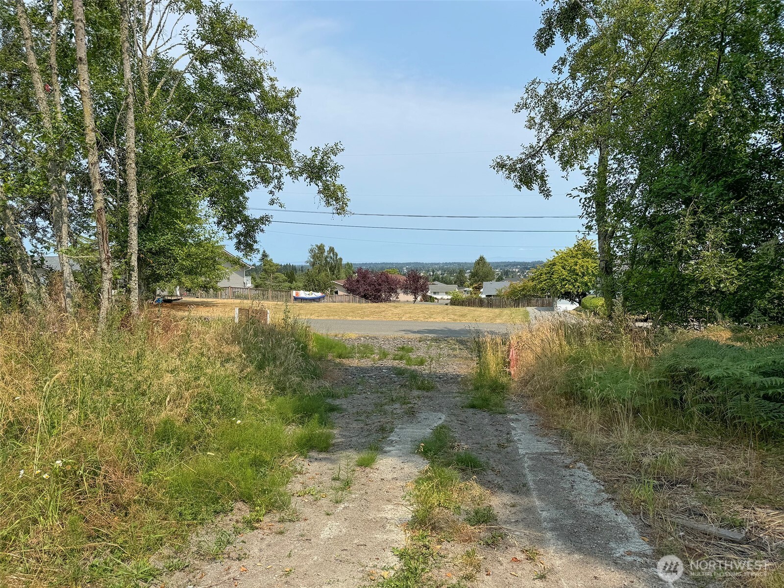 319 Reservoir Road Sequim, WA 98382 - Photo 36 of 38 a view of lake from a yard