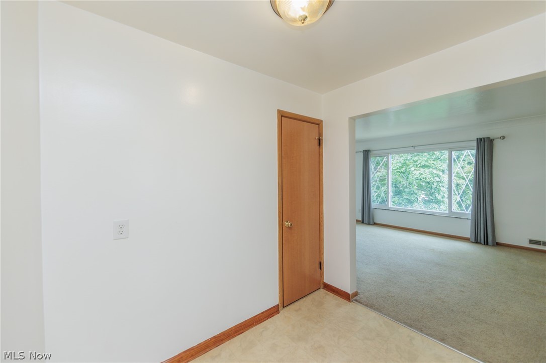 6147 Holburn Road Cleveland, OH 44129 - Photo 24 of 45 Empty room featuring light colored carpet