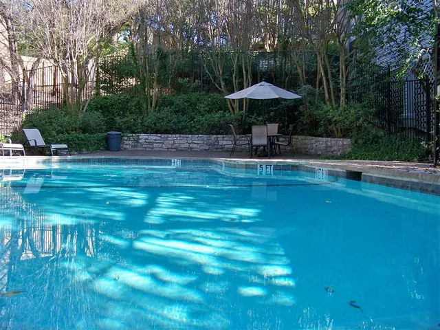 a view of a backyard with green space