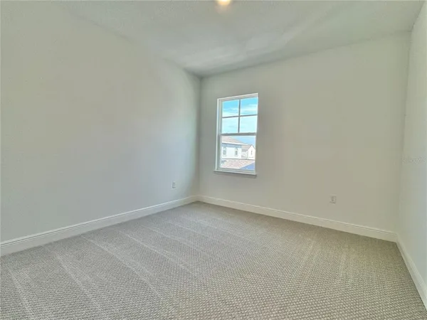 a view of a bathroom from the hallway