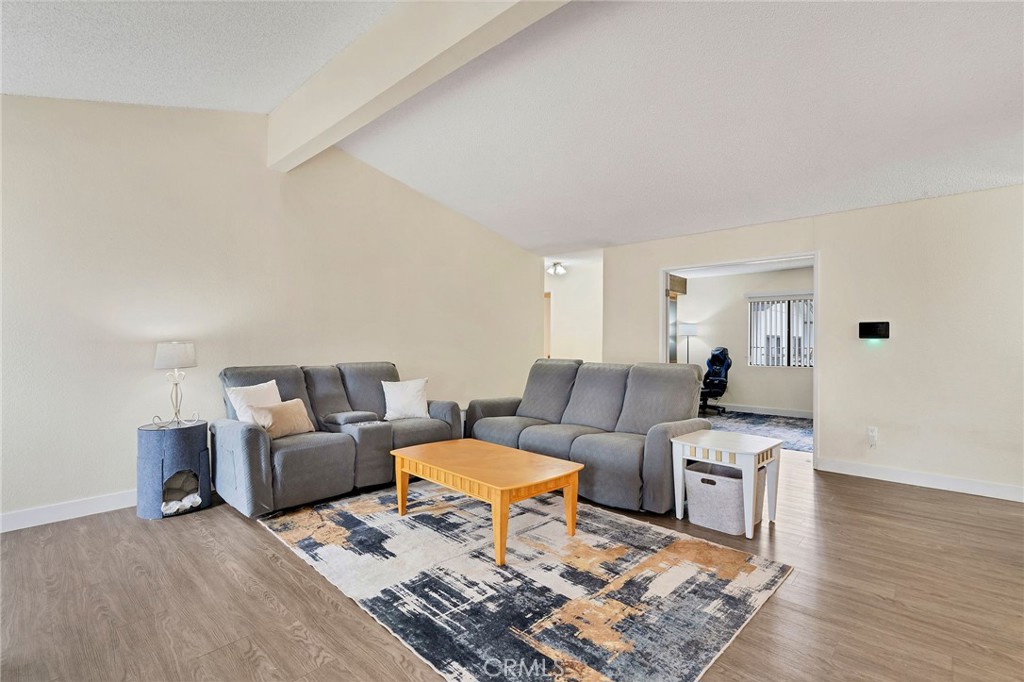 24800 Cornstalk Road Wildomar, CA 92595 - Photo 7 of 19 a living room with furniture and wooden floor