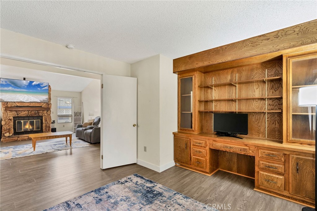 24800 Cornstalk Road Wildomar, CA 92595 - Photo 8 of 19 a view of living room with furniture and flat screen tv