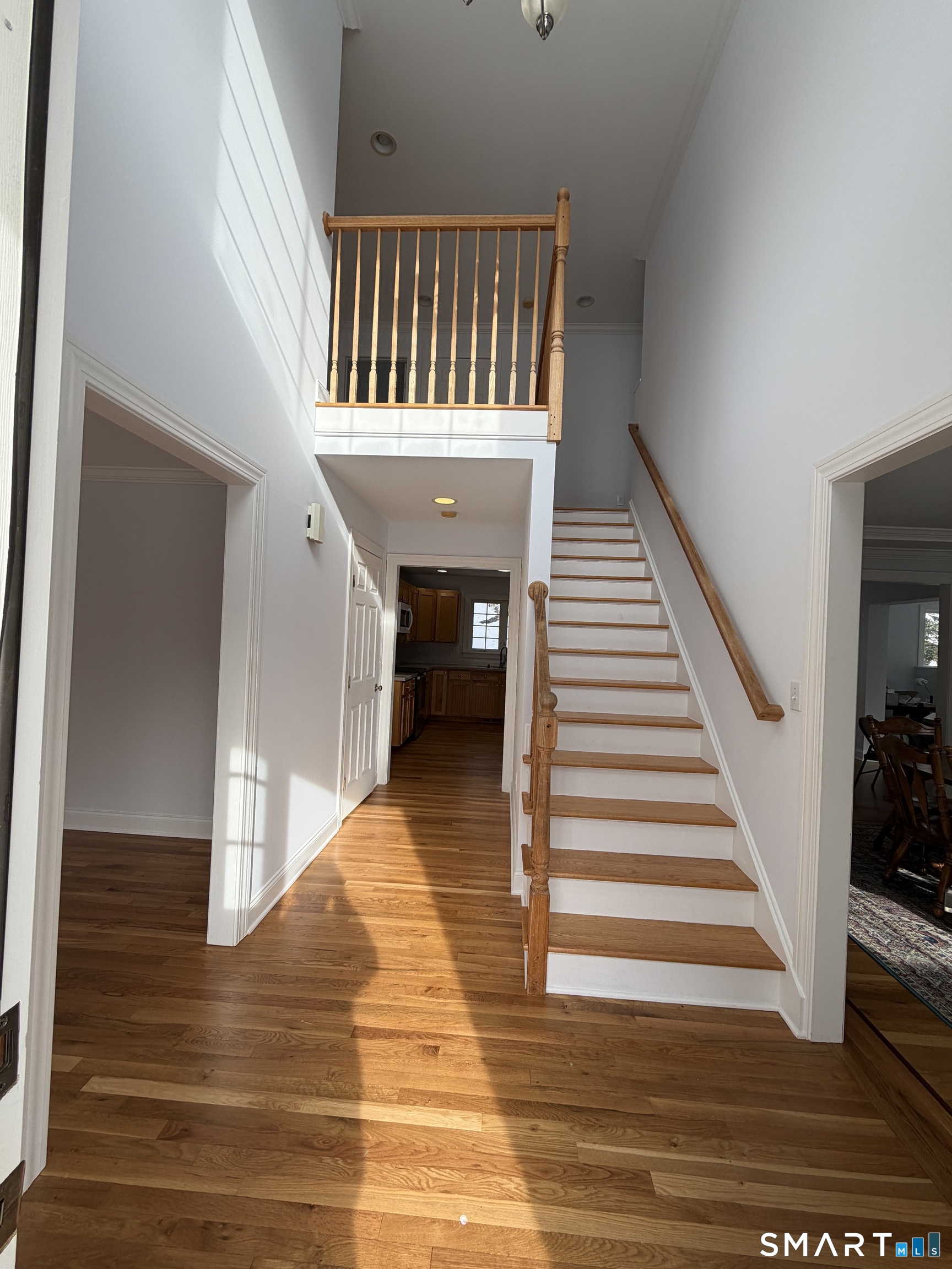 55 A Butterfield Road Newtown, CT 06470 - Photo 15 of 33 a view of entryway and hall with wooden floor