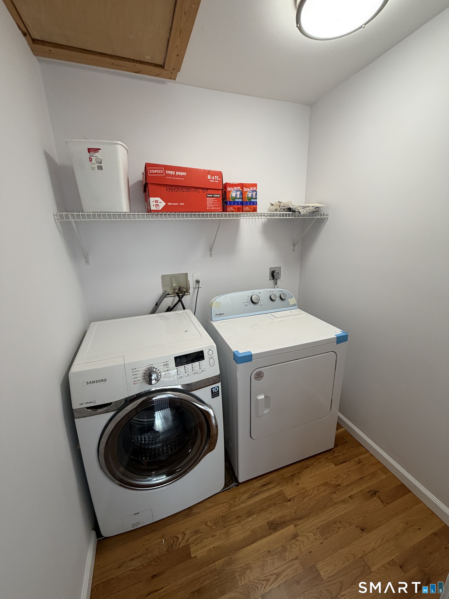 55 A Butterfield Road Newtown, CT 06470 - Photo 20 of 33 a utility room with a sink a washer and dryer