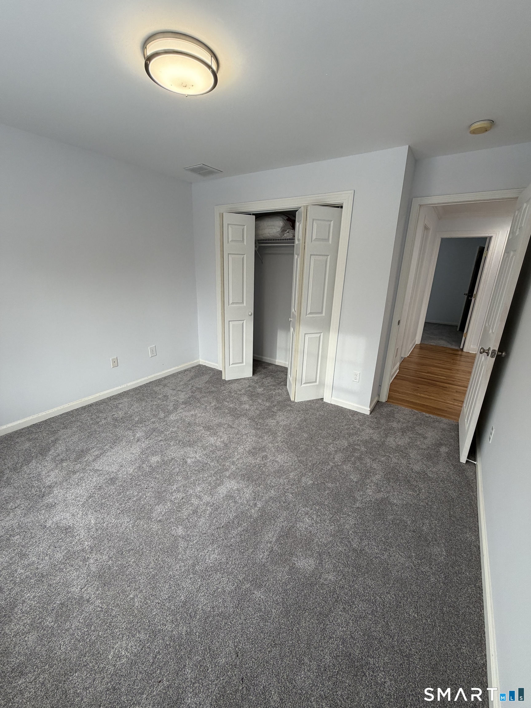 55 A Butterfield Road Newtown, CT 06470 - Photo 23 of 33 an empty room with window