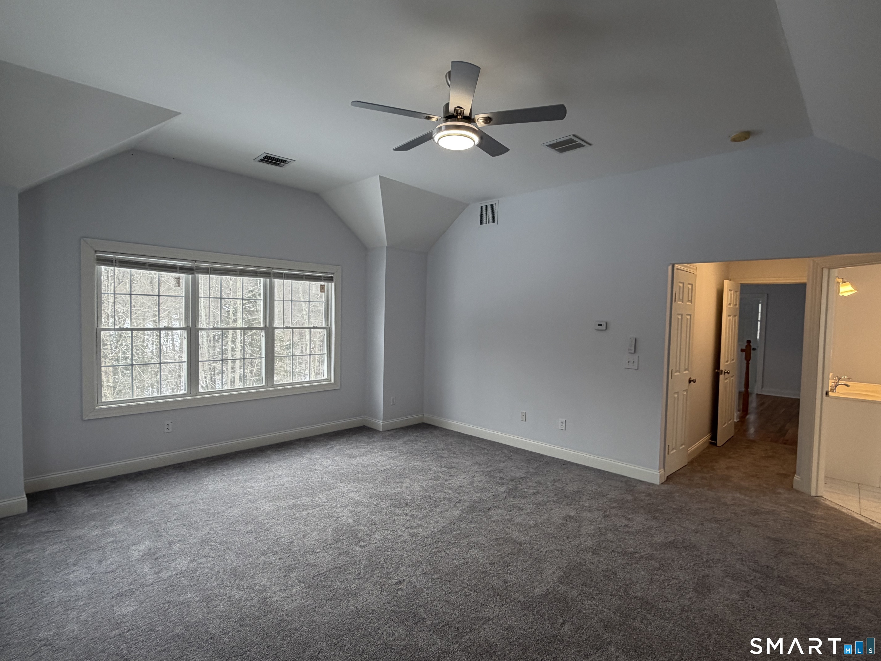 55 A Butterfield Road Newtown, CT 06470 - Photo 30 of 33 a view of an empty room with a window