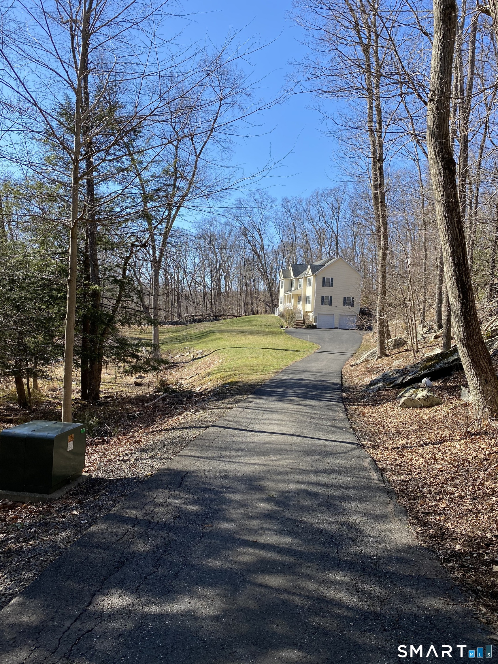 55 A Butterfield Road Newtown, CT 06470 - Photo 5 of 33 a view of a yard with an outdoor space
