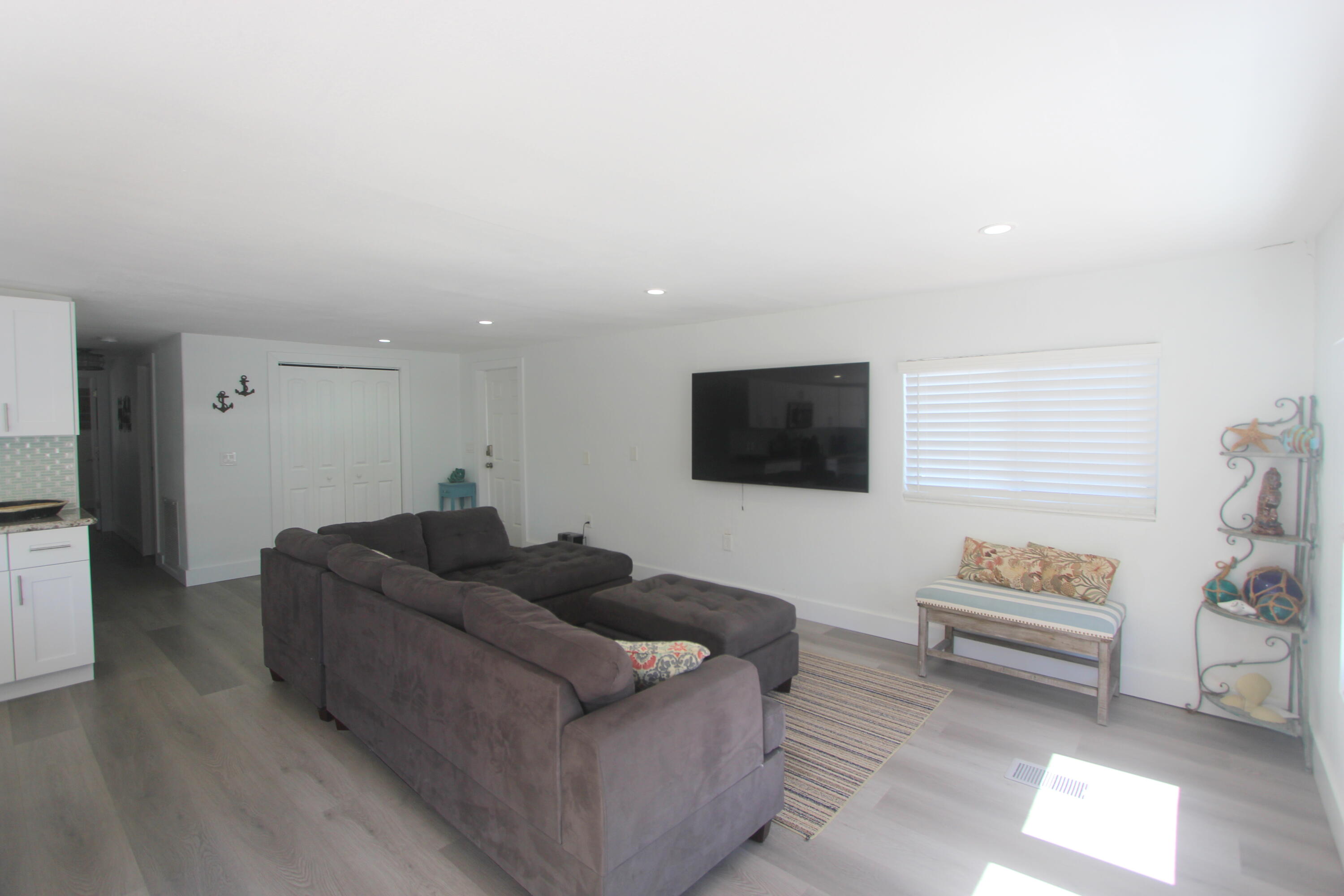 211 Lance Lane Key Largo, FL 33037 - Photo 16 of 52 a living room with furniture and a flat screen tv
