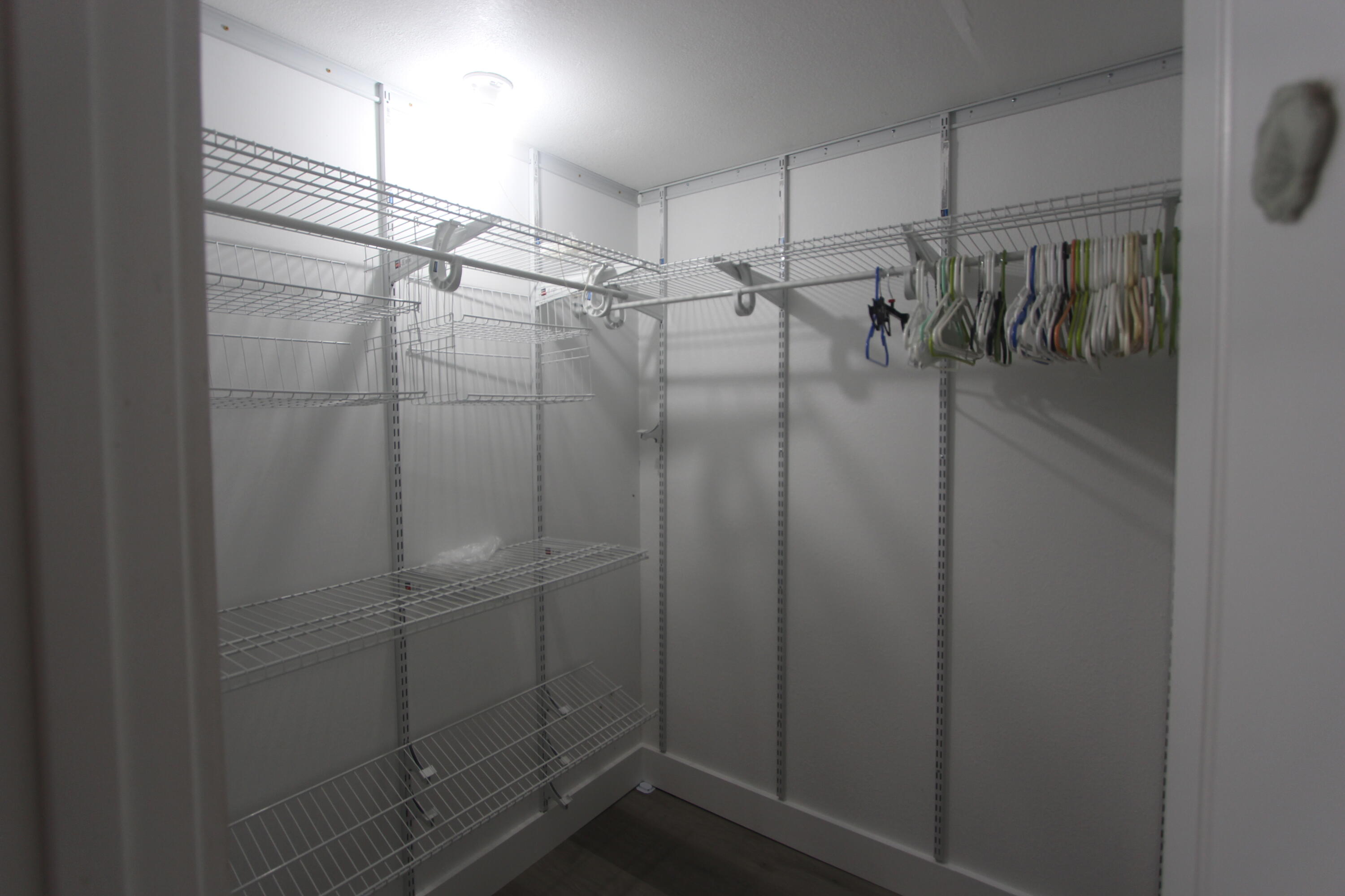 211 Lance Lane Key Largo, FL 33037 - Photo 26 of 52 a view of a room with racks on the wall