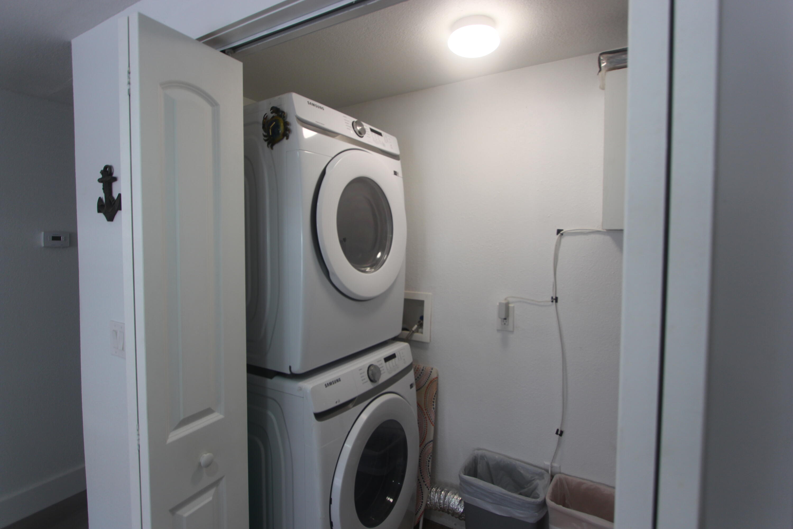 211 Lance Lane Key Largo, FL 33037 - Photo 28 of 52 a utility room with dryer and washer