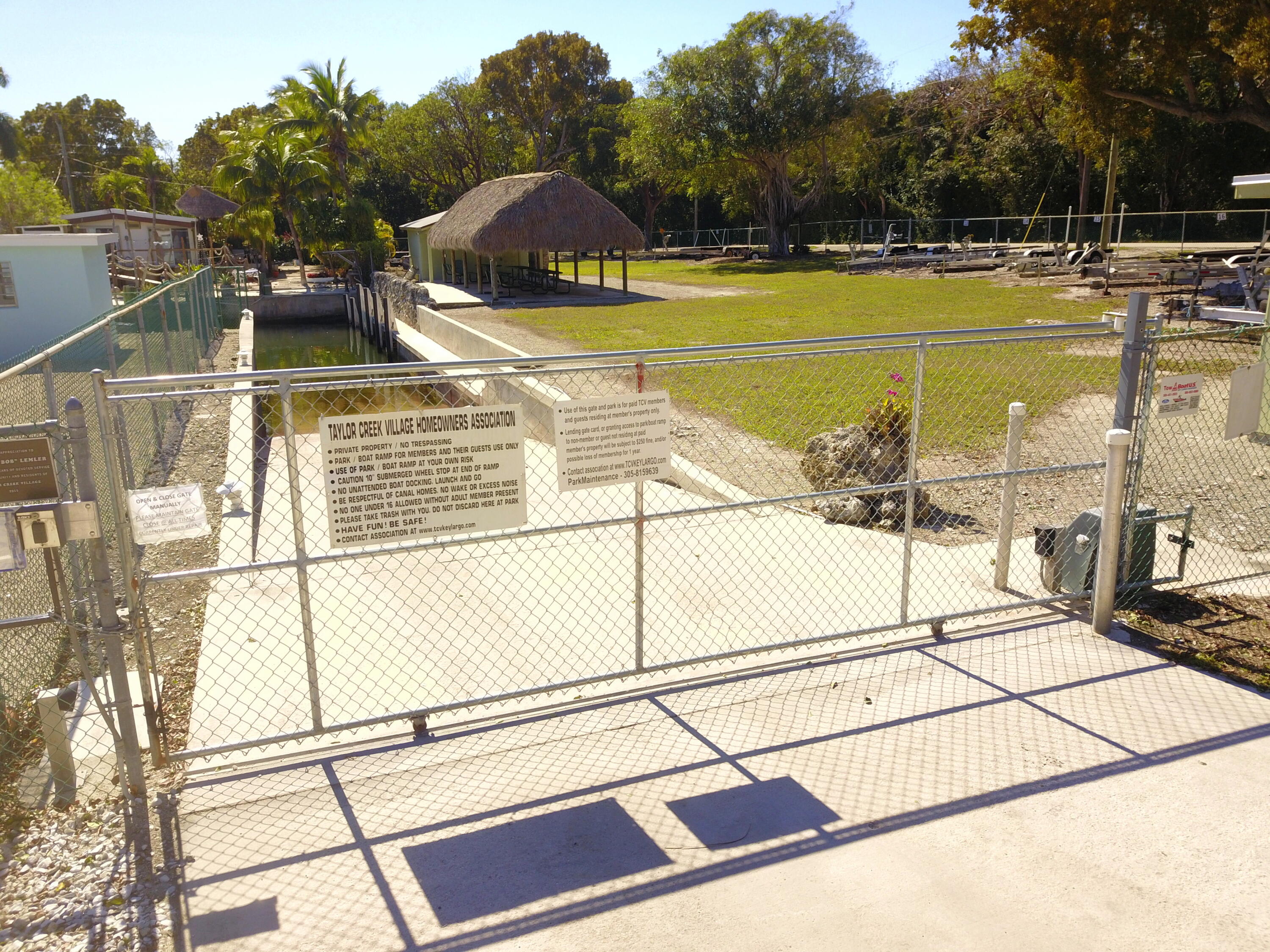 211 Lance Lane Key Largo, FL 33037 - Photo 46 of 52 a view of swimming pool with seating area and trees around