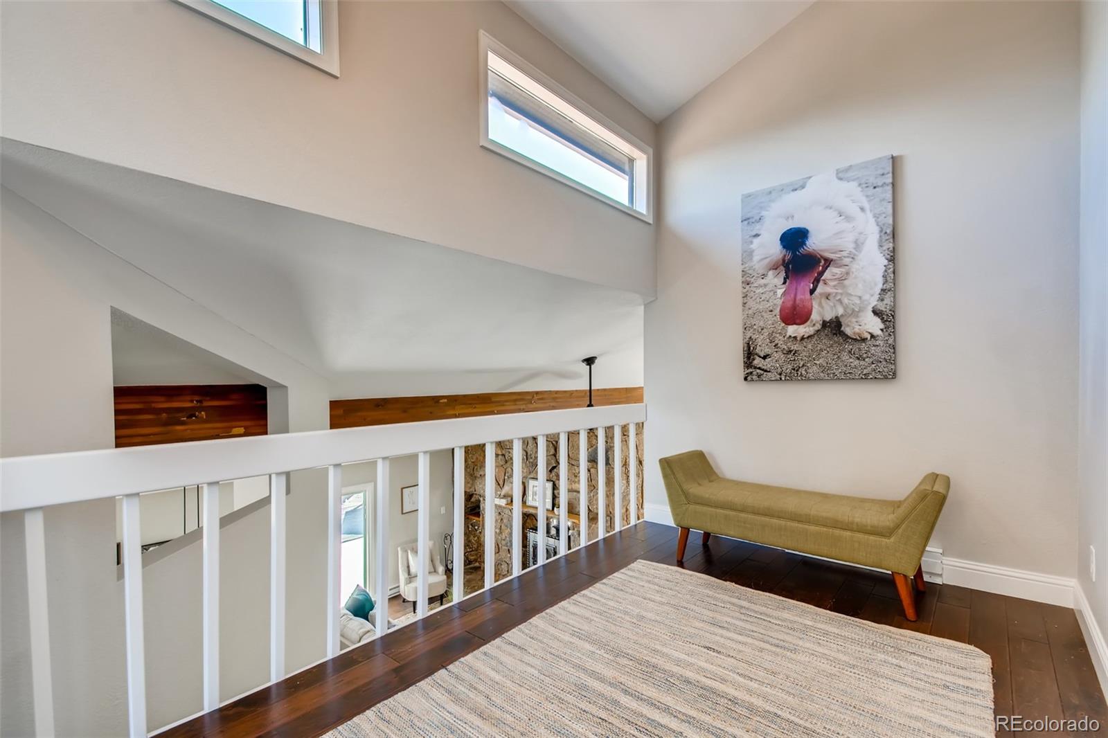 27732 Squaw Pass Road Evergreen, CO 80439 - Photo 27 of 38 a bedroom with furniture and a window