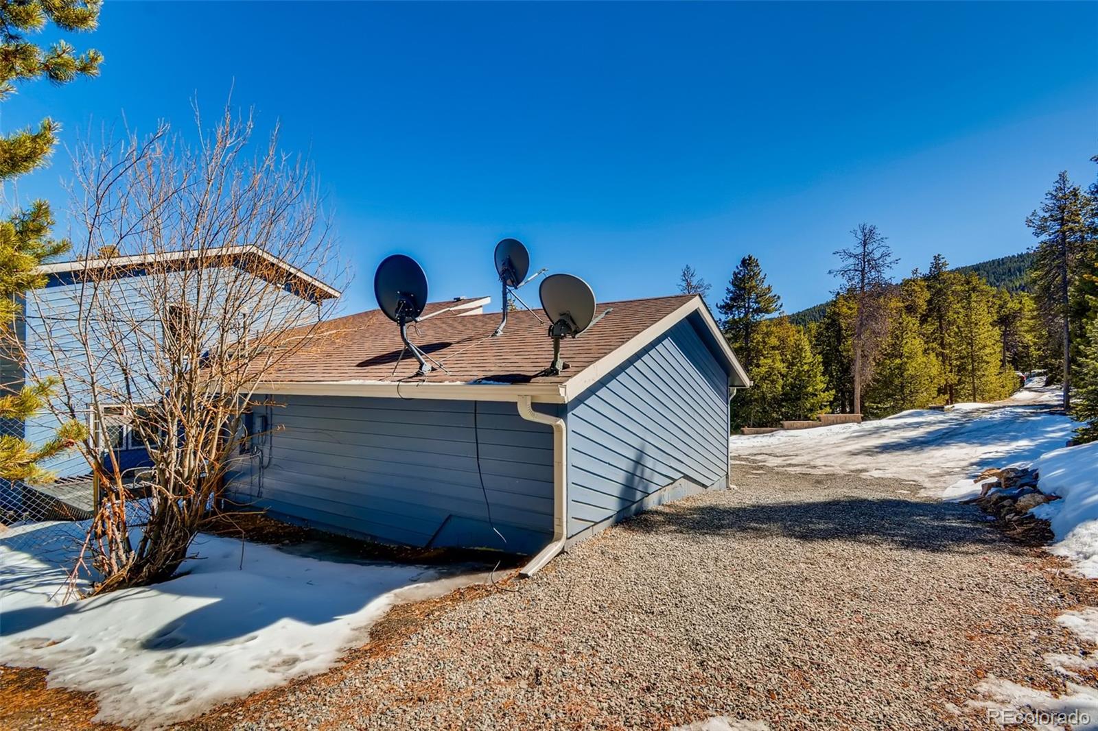 27732 Squaw Pass Road Evergreen, CO 80439 - Photo 32 of 38 a view of backyard of house