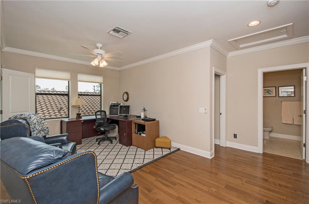4423 Raffia Palm Circle Naples, FL 34119 - Photo 16 of 25 Bonus room situated between 2 guest bedrooms & 2 full baths.