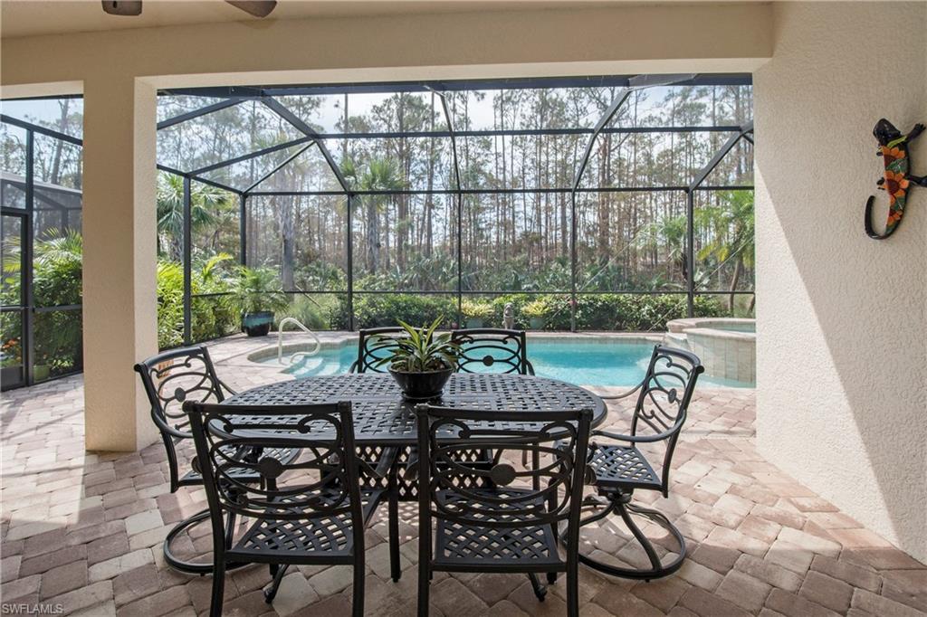 4423 Raffia Palm Circle Naples, FL 34119 - Photo 23 of 25 Plenty of covered lanai space.