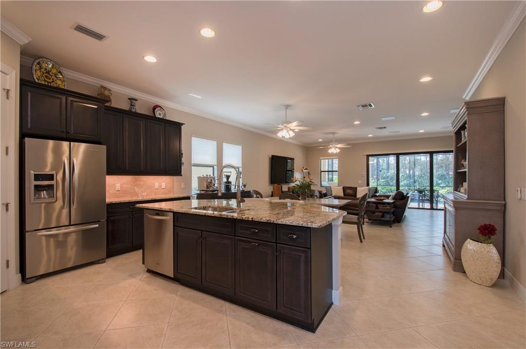 4423 Raffia Palm Circle Naples, FL 34119 - Photo 3 of 25 Fabulous Open Kitchen with upgraded single level island!