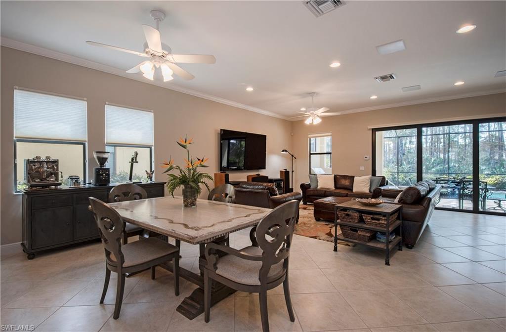4423 Raffia Palm Circle Naples, FL 34119 - Photo 4 of 25 Expansive great room with wired surround sound!