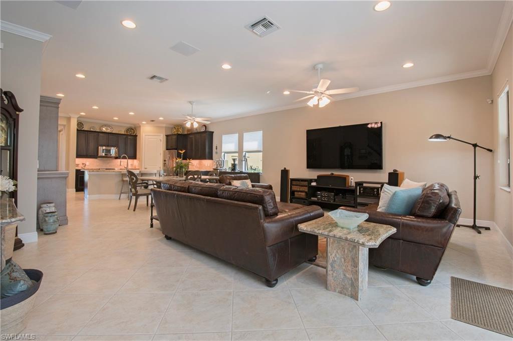 4423 Raffia Palm Circle Naples, FL 34119 - Photo 7 of 25 20" X 20" fine porcalain tile on the diagonal.