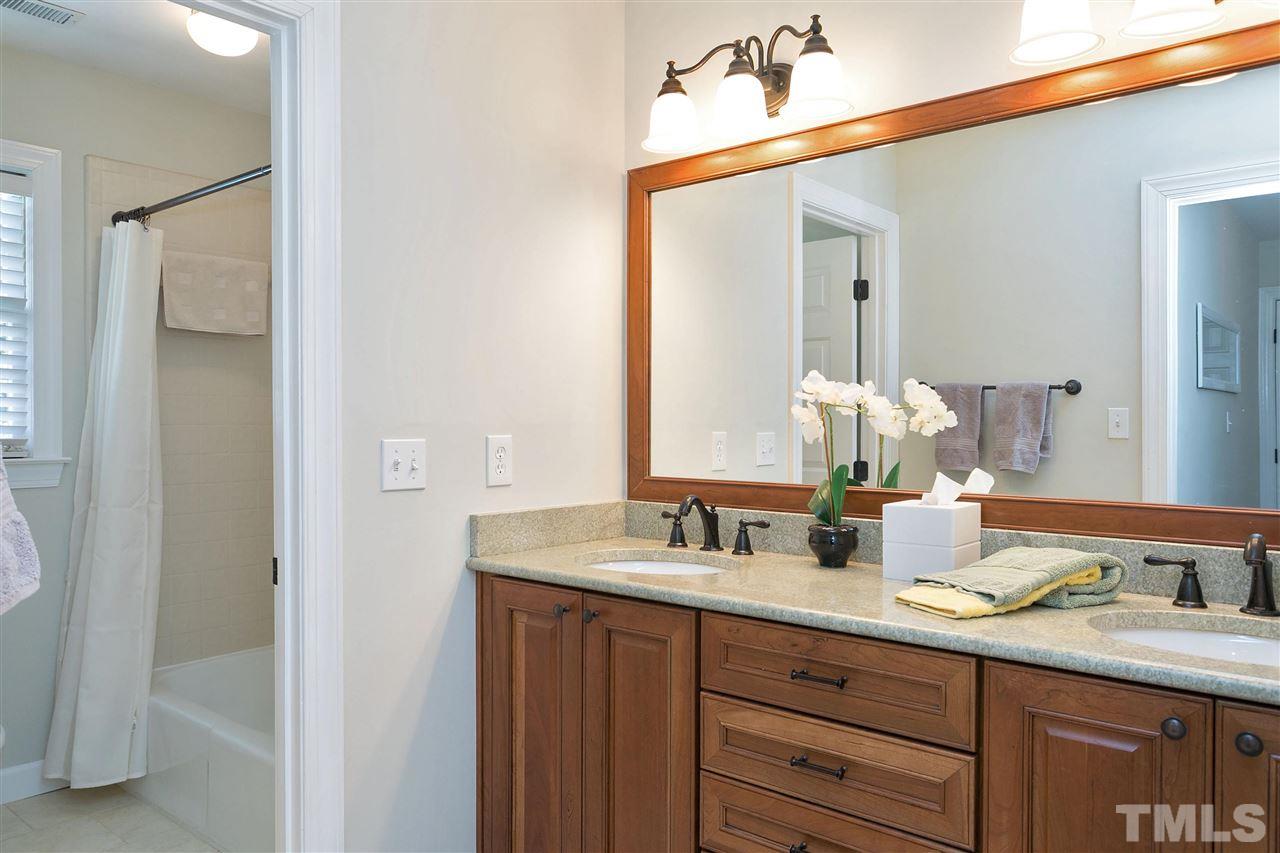 7102 Spring Ridge Road Cary, NC 27518 - Photo 19 of 25 EVEN THE SECONDARY BEDROOM GOT AN UPDATE RENOVATION IN 2010!