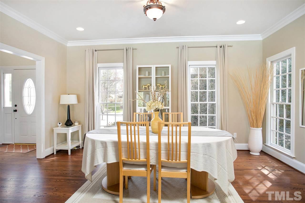 7102 Spring Ridge Road Cary, NC 27518 - Photo 3 of 25 HUGE SPACE WITH HARDWOOD FLOORS, INCREDIBLE WINDOWS AND OPEN TO FAMILY ROOM!