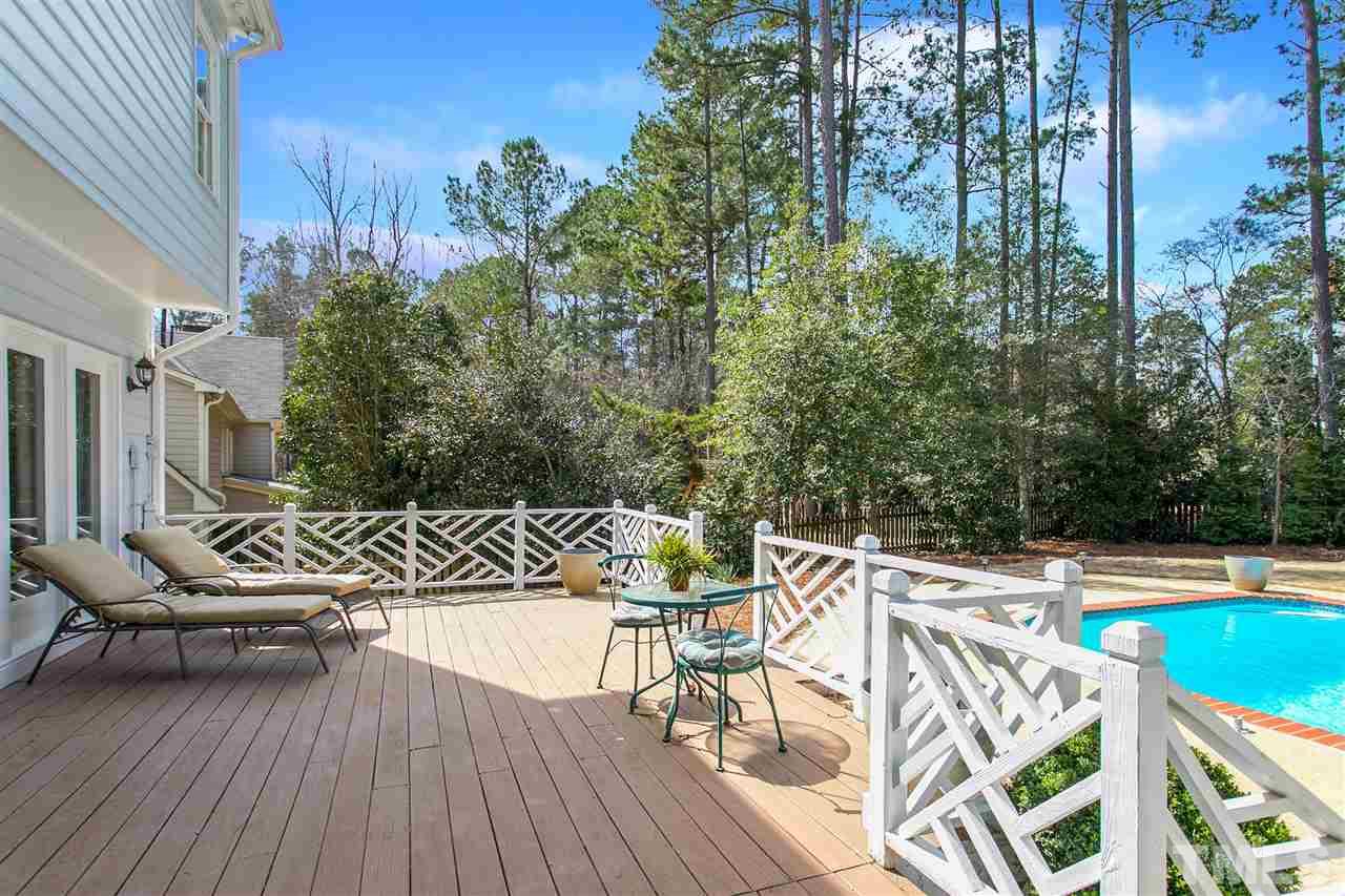 7102 Spring Ridge Road Cary, NC 27518 - Photo 23 of 25 ENORMOUS DECK OVERLOOKING THE POOL! PICTURE PERFECT!!