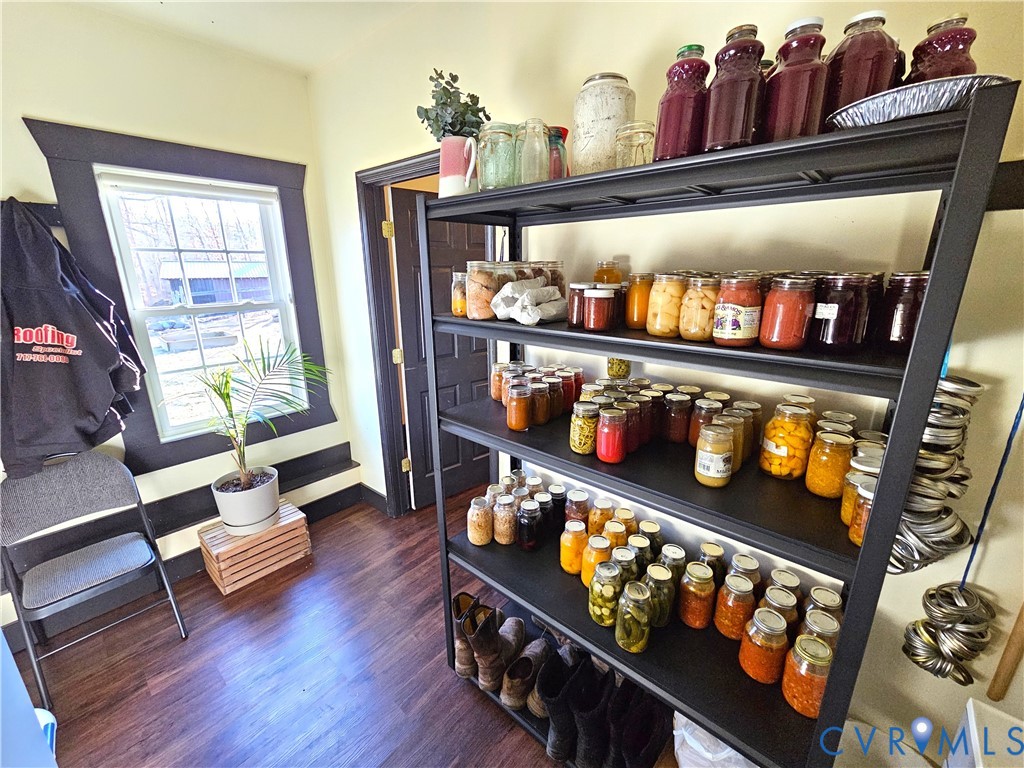 3814 South Constitution Route Dillwyn, VA 23936 - Photo 11 of 42 a living room with chairs and a wooden floor