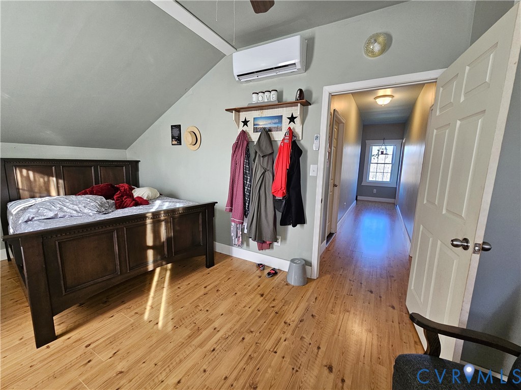 3814 South Constitution Route Dillwyn, VA 23936 - Photo 13 of 42 a walk in closet with wooden floor