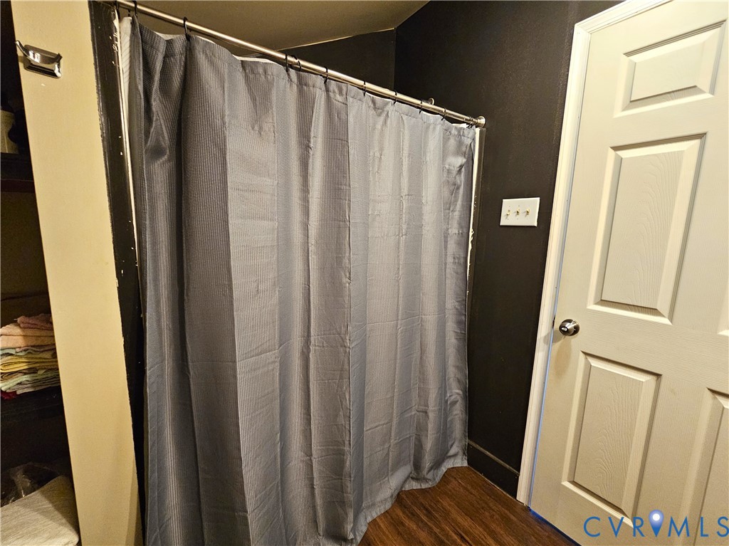 3814 South Constitution Route Dillwyn, VA 23936 - Photo 18 of 42 a view of a bathroom with shower curtain