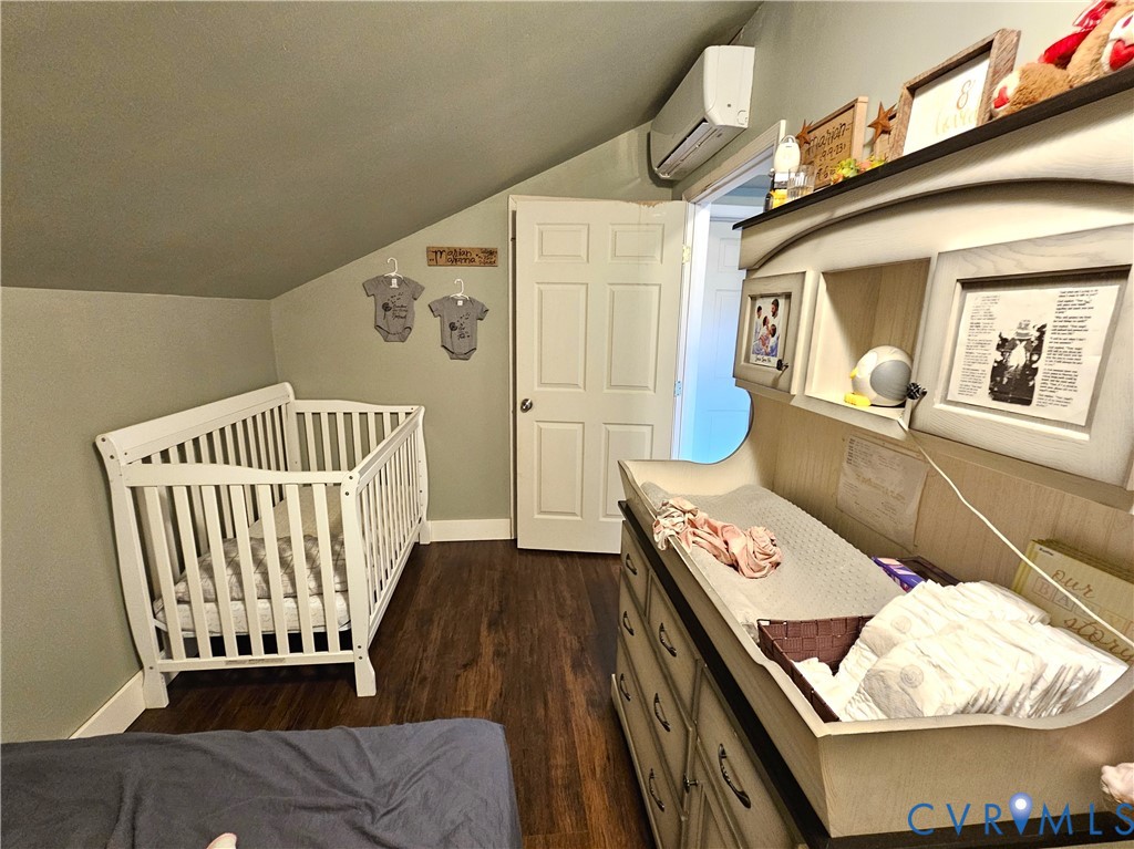 3814 South Constitution Route Dillwyn, VA 23936 - Photo 19 of 42 a living room with furniture and a wooden floor