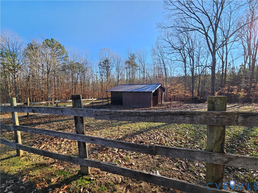 3814 South Constitution Route Dillwyn, VA 23936 - Photo 23 of 42 a view of a yard with wooden fence