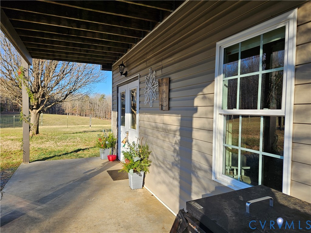3814 South Constitution Route Dillwyn, VA 23936 - Photo 3 of 42 a view of a porch with potted plants