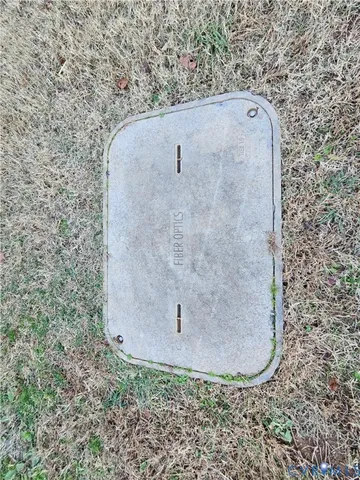 a large yard with lots of green space