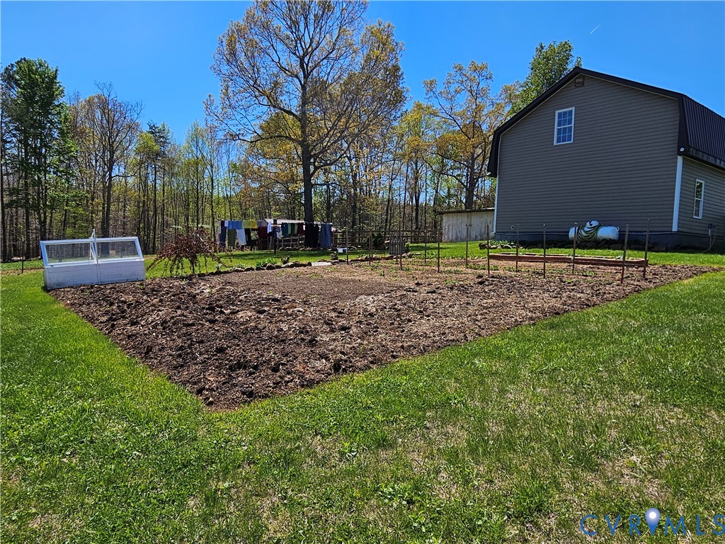 3814 South Constitution Route Dillwyn, VA 23936 - Photo 38 of 49 a view of a house with a yard