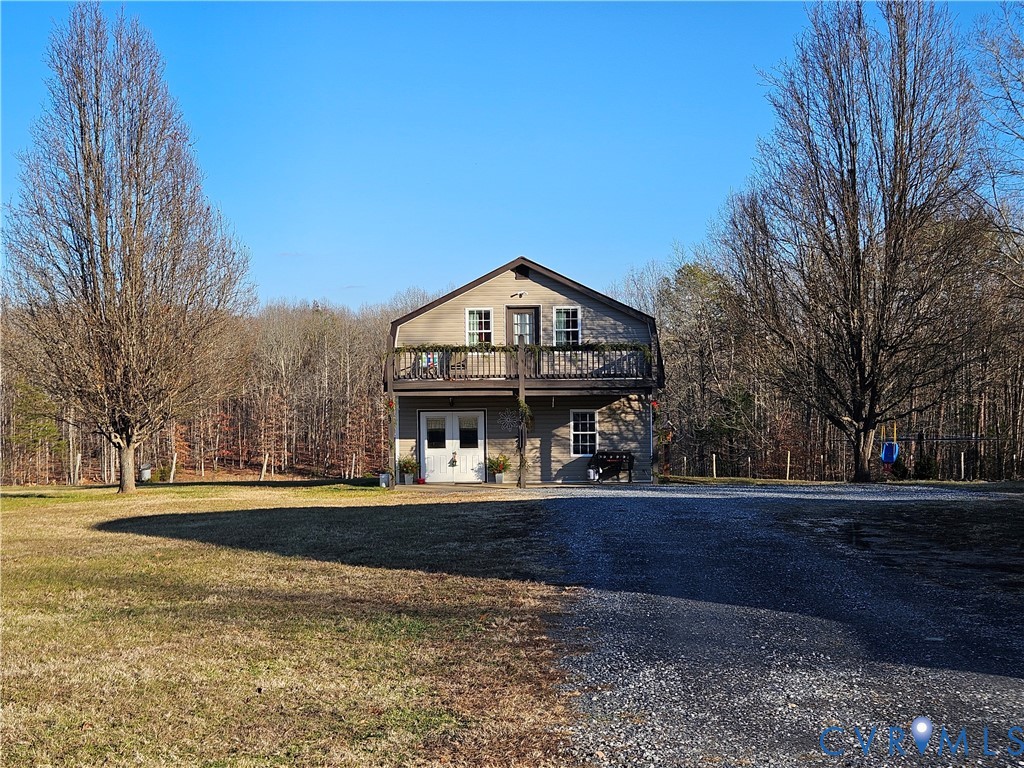 3814 South Constitution Route Dillwyn, VA 23936 - Photo 40 of 42 a front view of a house with a yard
