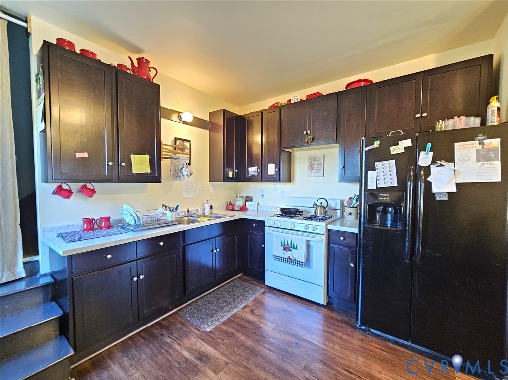 3814 South Constitution Route Dillwyn, VA 23936 - Photo 6 of 42 a kitchen with granite countertop a sink cabinets and stainless steel appliances