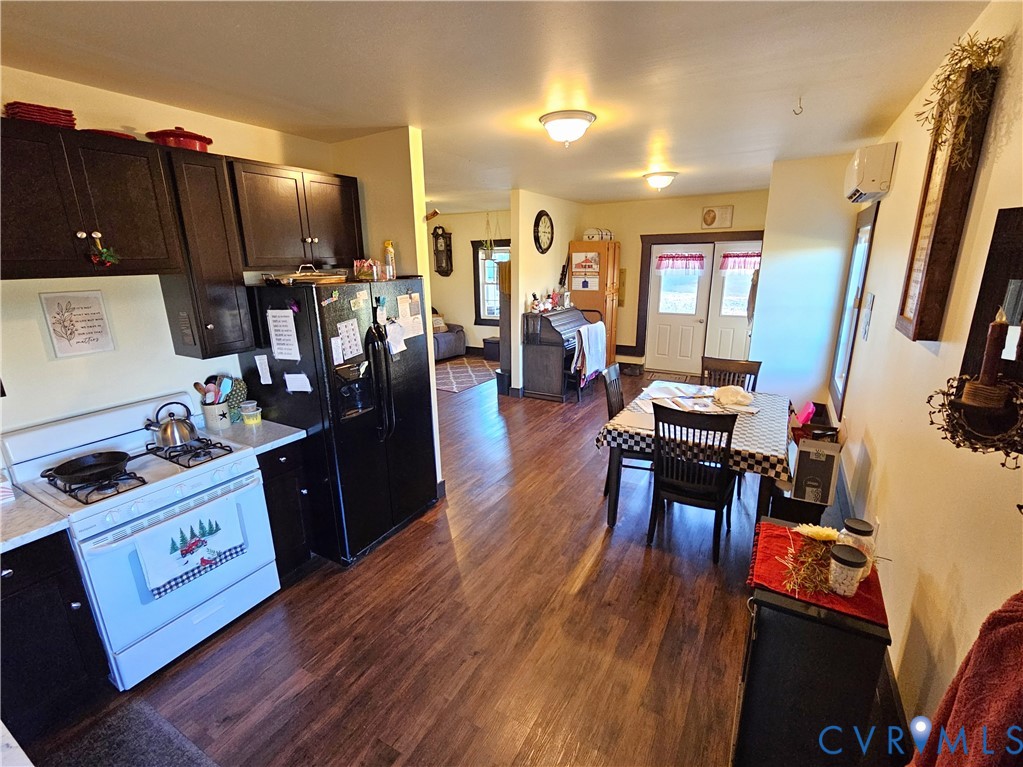 3814 South Constitution Route Dillwyn, VA 23936 - Photo 7 of 42 a living room with furniture and a flat screen tv