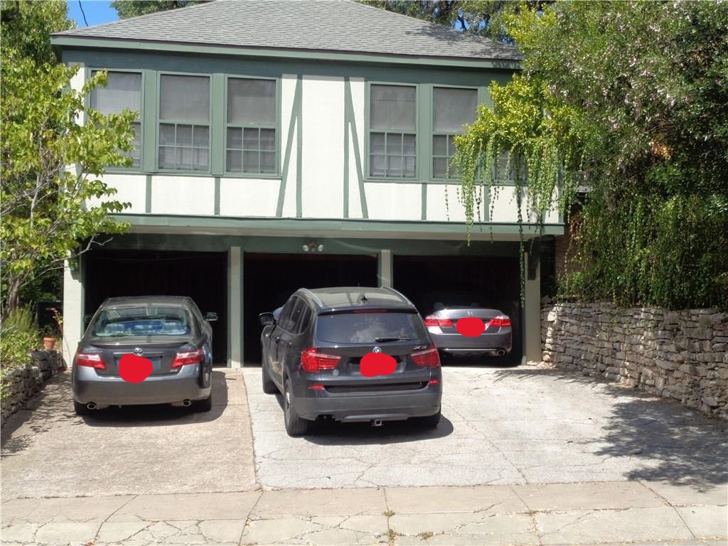 a car parked in front of a house