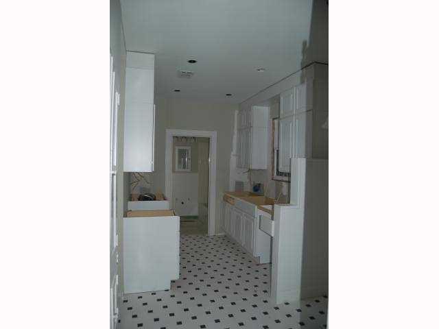 3106 Walling Drive Austin, TX 78705 - Photo 11 of 30 a bathroom with a sink a toilet and shower